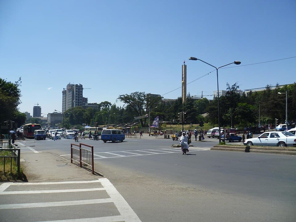 A street in Addis Ababa - the Tiglachin monument visible in the distance, Ethiopia